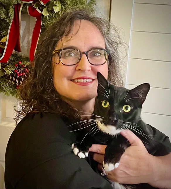Dr. Elizabeth Wynn holding one of her rescue cats